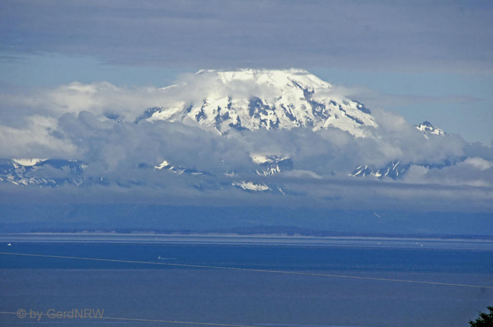 View of Volcano Mount Redoubt from Kenai Peninsula over Cook Inlet, Alaska, USA
